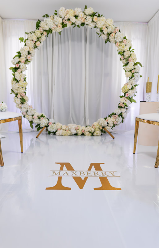 Custom wedding dance floor and floral arch